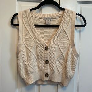 Cream colored sweater vest. Size small. Brand: “Sincerely Jules.”